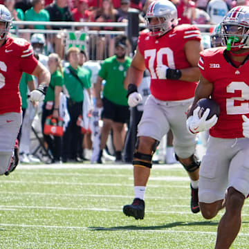 Ohio State receiver Emeka Egbuka runs for a touchdown against Marshall.