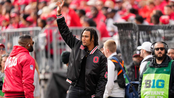 Oct 21, 2023; Columbus, Ohio, USA; Houston Texans quarterback CJ Stroud waves to fans during the NCAA football game between the Ohio State Buckeyes and the Penn State Nittany Lions at Ohio Stadium.