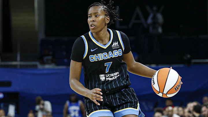 Jul 12, 2025; Chicago, Illinois, USA; Chicago Sky guard Ariel Atkins (7) brings the ball up court against the Minnesota Lynx during the second half of a WNBA game at Wintrust Arena. Mandatory Credit: Kamil Krzaczynski-Imagn Images