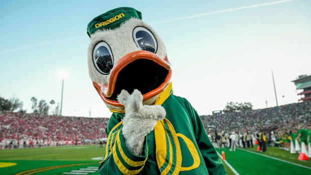 The Oregon Ducks mascot walks the sideline during the College Football Playoff quarterfinal against the Ohio State Buckeyes a