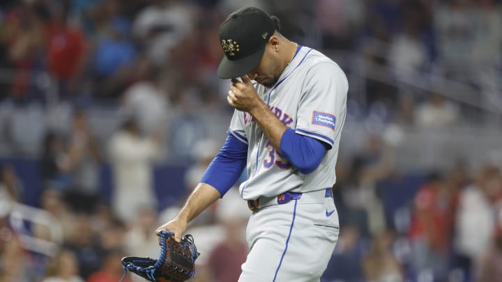 May 18, 2024; Miami, Florida, USA;  New York Mets relief pitcher Edwin Diaz (39) reacts as he leaves the mound after giving up four runs against the Miami Marlins in the ninth inning at loanDepot Park.