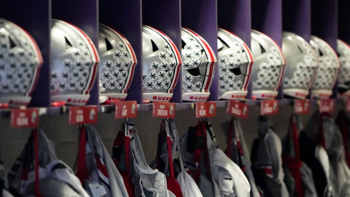 Nov 5, 2022; Evanston, Illinois, USA; Ohio State Buckeyes helmets and uniforms hang in the locker room prior to the NCAA football game between the Northwestern Wildcats and the Ohio State Buckeyes at Ryan Field. Mandatory Credit: Adam Cairns-The Columbus Dispatch

Ncaa Football Ohio State Buckeyes At Northwestern Wildcats