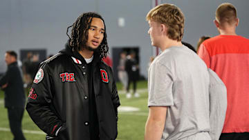 Mar 20, 2024; Columbus, Ohio, USA; Houston Texans quarterback CJ Stroud talks to Ohio State Buckeyes quarterback Devin Brown during Pro Day at the Woody Hayes Athletic Center.