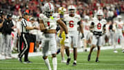 Ohio State Buckeyes corner Davison Igbinosun celebrates during the College Football Playoff National Championship