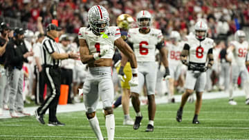 Ohio State Buckeyes corner Davison Igbinosun celebrates during the College Football Playoff National Championship