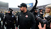 Ohio State Buckeyes head coach Ryan Day leaves the fieldfollowing the NCAA football game against the Michigan Wolverines at Michigan Stadium in Ann Arbor, Mich. on Nov. 29, 2025. Ohio State won 27-9.
