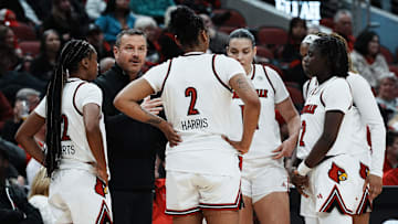 Louisville head coach Jeff Walz instructed his team against Oklahoma during their game at the KFC Yum! Center in Louisville, Ky. on Dec. 4, 2024.