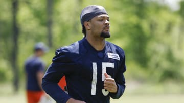 Chicago Bears wide receiver Rome Odunze (15) warms up during organized team activities at Halas Hall