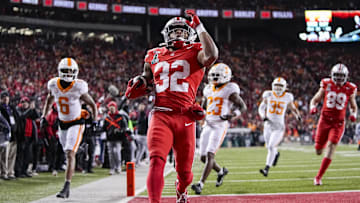 Ohio State Buckeyes running back TreVeyon Henderson (32) runs for a touchdown during the first half of the College Football Playoff first round game against the Tennessee Volunteers at Ohio Stadium in Columbus on Dec. 21, 2024.