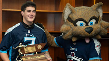 Division II - Class A 2024 Tennessee Titans Mr. Football Jared Curtis, Nashville Christian School, is photographed with T-Rac during the Titans Mr. Football Awards at Nissan Stadium in Nashville, Tenn., Tuesday, Dec. 10, 2024.