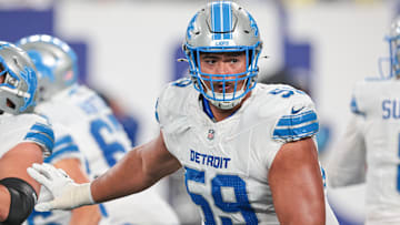 Detroit Lions offensive tackle Giovanni Manu (59) blocks during the second half against the New York Giants at MetLife Stadium.