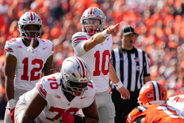 Ohio State Buckeyes quarterback Julian Sayin motions during the Buckeyes' 2025 game against Illinois