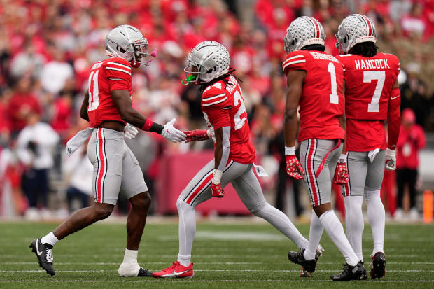 Secondary celebrates after a play.