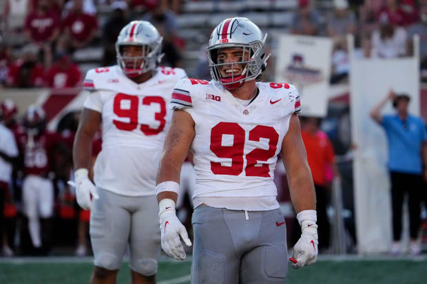 Defensive end smiles on the field.