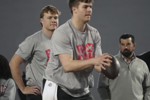 Quarterbacks throw to wide receivers during Pro Day.