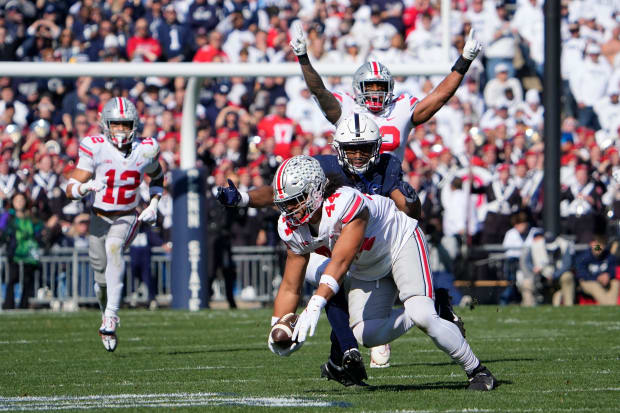 Defensive end dives for interception.