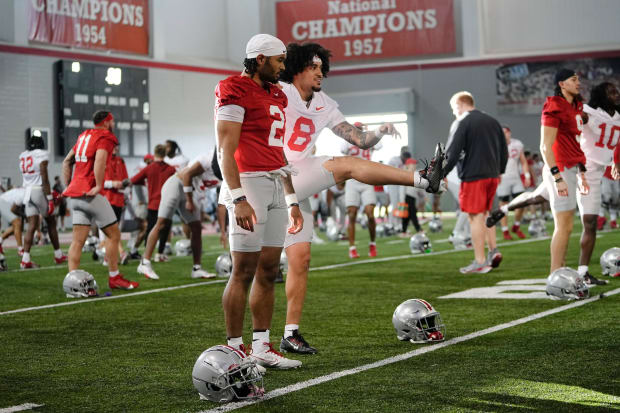 Ohio State players stretch together before practice.