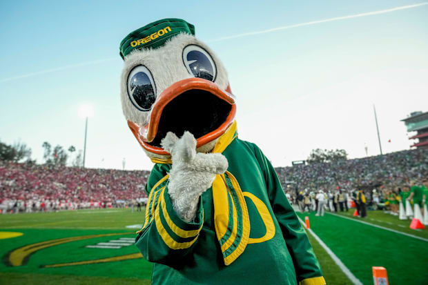 The Oregon Ducks mascot walks the sideline during the College Football Playoff quarterfinal against the Ohio State Buckeyes a