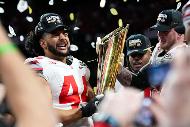 Ohio State Buckeyes defensive end JT Tuimoloau (44) celebrates after defeating Notre Dame.