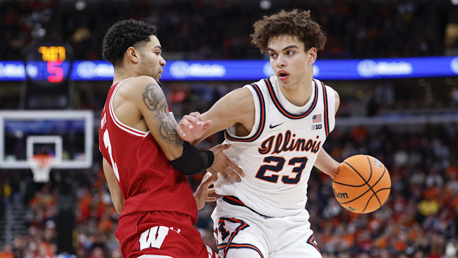 Wisconsin guard Nick Boyd defends against Illinois guard Keaton Wagler.