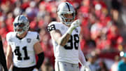 Dec 8, 2024; Tampa, Florida, USA; Las Vegas Raiders defensive end Maxx Crosby (98) celebrates after a sack against the Tampa Bay Buccaneers in the second quarter at Raymond James Stadium. Mandatory Credit: Nathan Ray Seebeck-Imagn Images