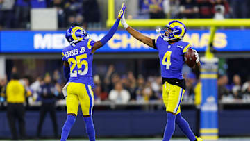 Los Angeles Rams cornerbacks Emmanuel Forbes (25) and Ahkello Witherspoon (4)