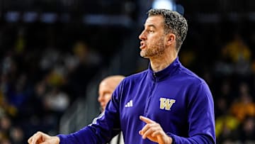 Washington head coach Danny Sprinkle reacts to a play against Washington during the first half at Crisler Center in Ann Arbor on Sunday, Jan. 12, 2025.