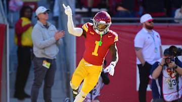 Nov 16, 2024; Los Angeles, California, USA; Southern California Trojans wide receiver Zachariah Branch (1) celebrates his touchdown scored against the Nebraska Cornhuskers during the first half at the Los Angeles Memorial Coliseum. Mandatory Credit: Gary A. Vasquez-Imagn Images