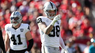 Dec 8, 2024; Tampa, Florida, USA; Las Vegas Raiders defensive end Maxx Crosby (98) celebrates after a sack against the Tampa Bay Buccaneers in the second quarter at Raymond James Stadium. Mandatory Credit: Nathan Ray Seebeck-Imagn Images