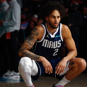 Apr 18, 2025; Memphis, Tennessee, USA; Dallas Mavericks center Dereck Lively II (2) stretches prior to the game against the Memphis Grizzlies at FedExForum. Mandatory Credit: Petre Thomas-Imagn Images