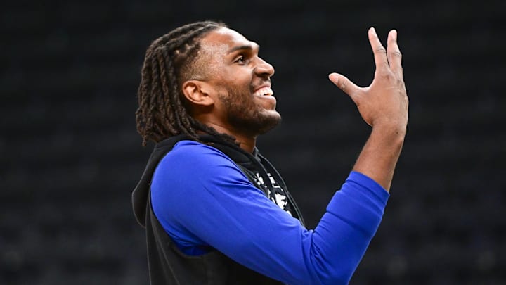 Golden State Warriors center Kevon Looney warms up before game against the Milwaukee Bucks. Golden State Warriors center Kevon Looney warms up before game against the Milwaukee Bucks.