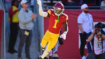 Nov 16, 2024; Los Angeles, California, USA; Southern California Trojans wide receiver Zachariah Branch (1) celebrates his touchdown scored against the Nebraska Cornhuskers during the first half at the Los Angeles Memorial Coliseum. Mandatory Credit: Gary A. Vasquez-Imagn Images