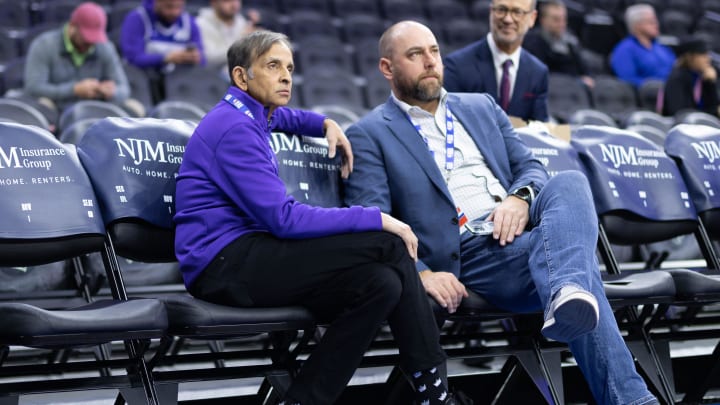Dec 13, 2022; Philadelphia, Pennsylvania, USA; Sacramento Kings owner Vivek Ranadive (L) and general manager Monte McNair (R) look on during warm ups before a game against the Philadelphia 76ers at Wells Fargo Center. Mandatory Credit: Bill Streicher-USA TODAY Sports