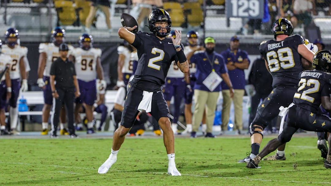 Sep 6, 2025; Orlando, Florida, USA; UCF Knights quarterback Tayven Jackson (2) throws a pass during the first quarter against the North Carolina A&T Aggies at Acrisure Bounce House. Mandatory Credit: Mike Watters-Imagn Images