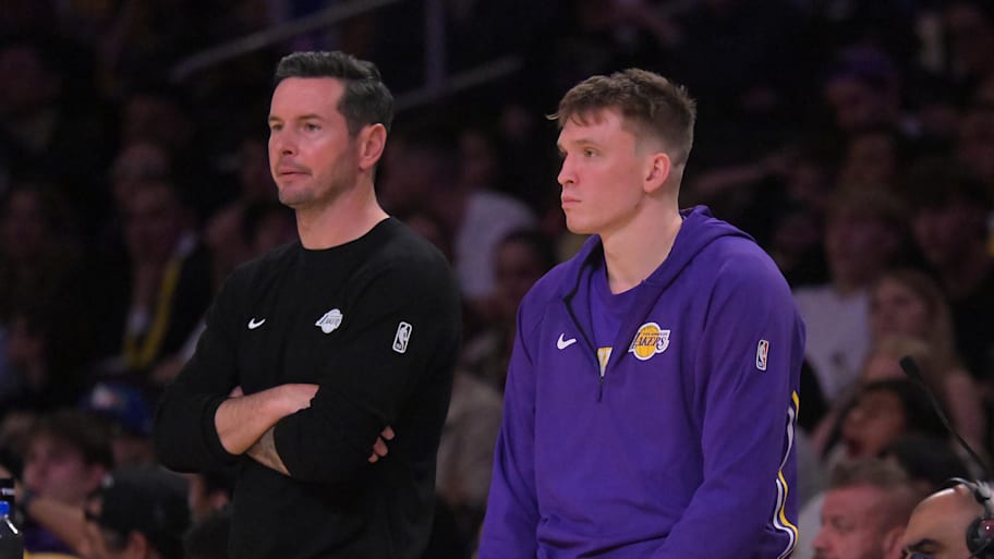 Los Angeles Lakers head coach JJ Redick waits with forward Dalton Knecht.