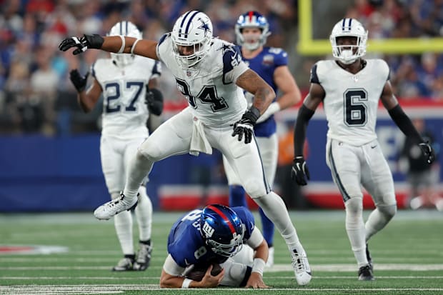Dallas Cowboys defensive end Marshawn Kneeland reacts after sacking New York Giants quarterback Daniel Jones.
