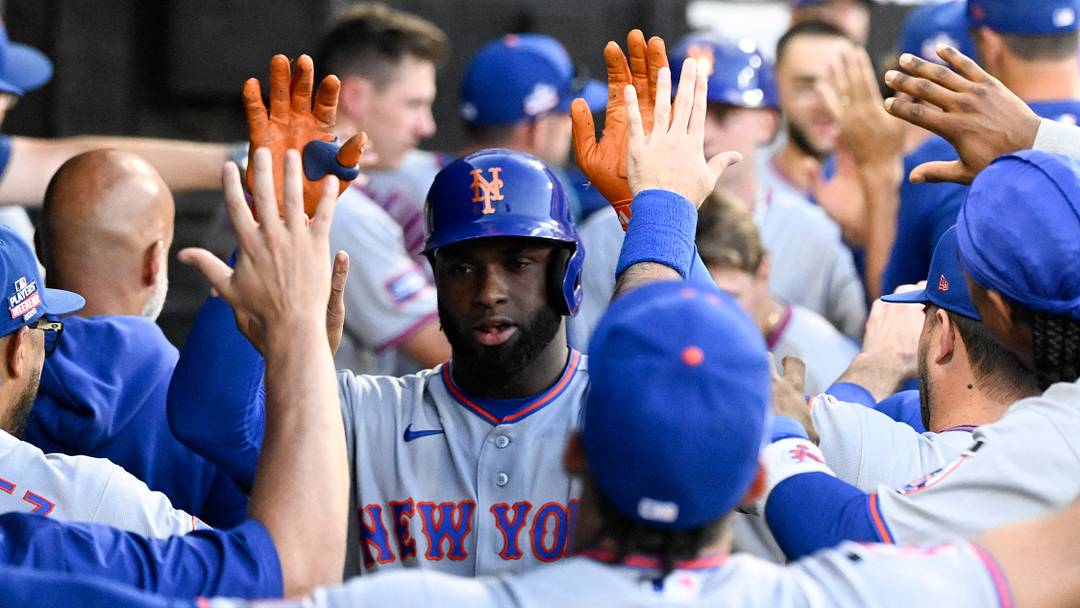 Aug 22, 2026; Chicago, Illinois, USA;  New York Mets center fielder Luis Robert Jr. (88) celebrates with teammates in the dugout after hitting a two-run home run against the Chicago White Sox during the third inning at Rate Field.  Mandatory Credit: Matt Marton-Imagn Images