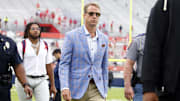 Sep 28, 2024; Oxford, Mississippi, USA; Mississippi Rebels head coach Lane Kiffin walks across the field at Vaught-Hemingway Stadium prior to the game against the Kentucky Wildcats. Mandatory Credit: Petre Thomas-Imagn Images