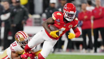 Feb 11, 2024; Paradise, Nevada, USA; San Francisco 49ers safety Logan Ryan (33) tackles Kansas City Chiefs wide receiver Rashee Rice (4) during the second quarter of Super Bowl LVIII at Allegiant Stadium. Mandatory Credit: Kirby Lee-USA TODAY Sports