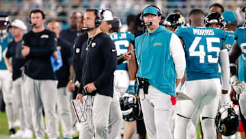 Aug 9, 2025; Jacksonville, Florida, USA; Jacksonville Jaguars defensive coordinator Anthony Campanile stands with head coach Liam Coen on the sidelines during a preseason game against the Pittsburgh Steelers at EverBank Stadium. Mandatory Credit: Travis Register-Imagn Images