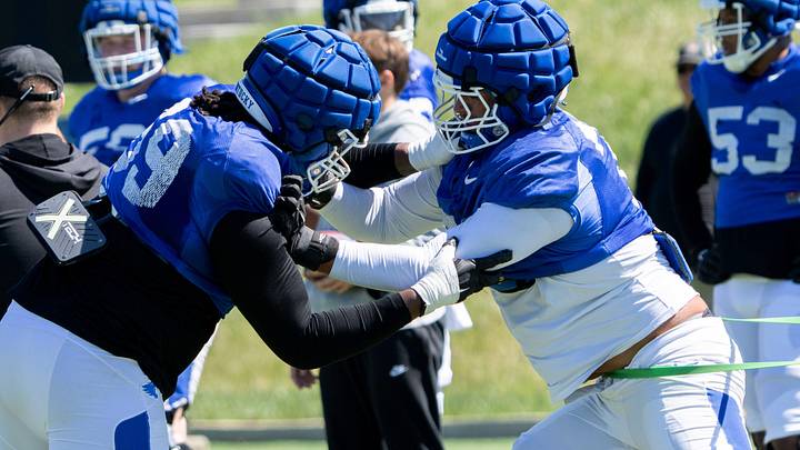 University of Kentucky offensive linebacker practices against offensive linebacker Malachi Wood during spring football practice on Saturday, April 6, 2024.