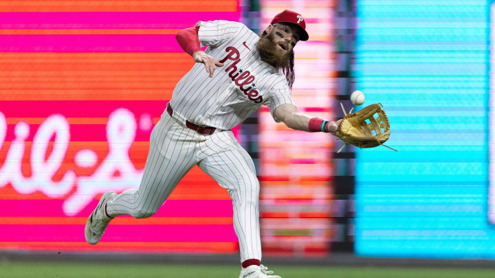 Jul 30, 2024; Philadelphia, Pennsylvania, USA; Philadelphia Phillies outfielder Brandon Marsh catches a ball or an out.