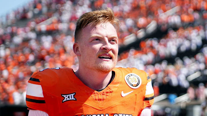 Oklahoma State's Alan Bowman (7) celebrates following the college football game between the Oklahoma State Cowboys and the Arkansas Razorbacks at Boone Pickens Stadium in Stillwater, Okla.,, Saturday, Sept., 7, 2024.