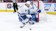 May 1, 2025; Ottawa, Ontario, CAN; Toronto Maple Leafs defenseman Christopher Tanev (8) chases the puck in game six of the first round of the 2025 Stanley Cup Playoffs against the Ottawa Senators at Canadian Tire Centre. Mandatory Credit: Marc DesRosiers-Imagn Images