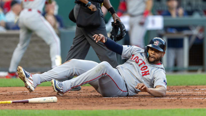 Aug 6, 2024; Kansas City, Missouri, USA;  Boston Red Sox first base Dominic Smith (2) scores during the second inning against the Kansas City Royals at Kauffman Stadium.