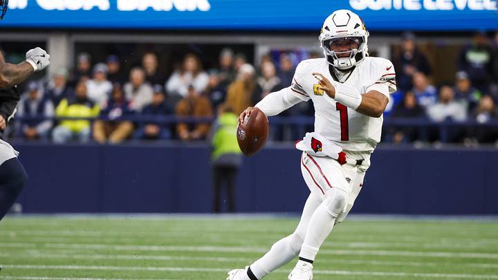 Nov 24, 2024; Seattle, Washington, USA; Arizona Cardinals quarterback Kyler Murray (1) rushes against the Seattle Seahawks during the fourth quarter at Lumen Field. Mandatory Credit: Joe Nicholson-Imagn Images