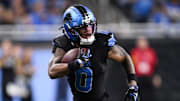 Detroit Lions running back Jahmyr Gibbs (0) runs with the ball for a touchdown during the fourth quarter against Giants