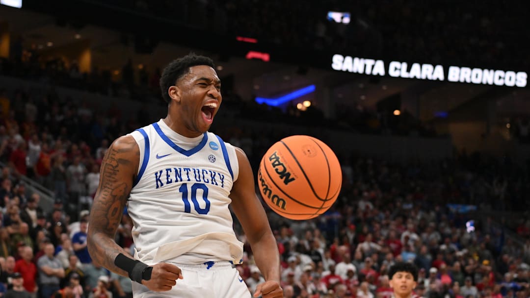 Mar 20, 2026; St. Louis, MO, USA; Kentucky Wildcats forward Brandon Garrison (10) reacts after dunking the ball against the Santa Clara Broncos during the overtime period of a first round game of the men's 2026 NCAA Tournament at Enterprise Center. Mandatory Credit: Jeff Curry-Imagn Images