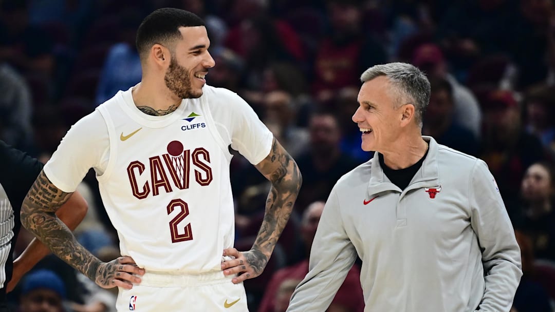 Oct 7, 2025; Cleveland, Ohio, USA; Cleveland Cavaliers guard Lonzo Ball (2) talks to Chicago Bulls Head Coach Billy Donovan during the first half at Rocket Arena. Mandatory Credit: Ken Blaze-Imagn Images
