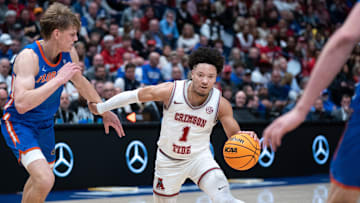 Alabama Crimson Tide guard Mark Sears (1) drives the paint against Florida Gators forward Thomas Haugh (10) during their SEC Men's Basketball Tournament quarterfinal game at Bridgestone Arena in Nashville, Tenn., Friday, March 15, 2024.at Bridgestone Arena in Nashville, Tenn., Friday, March 15, 2024.